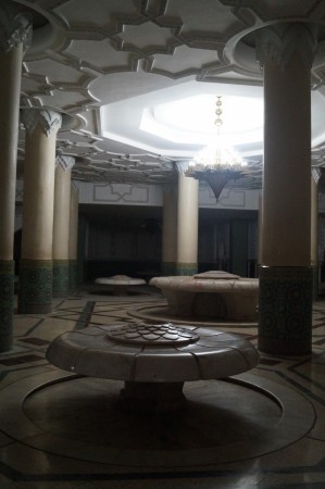 Chandeliers and a skylight in the abloutions room. Water for washing comes out of the top of the huge marble "flowers".