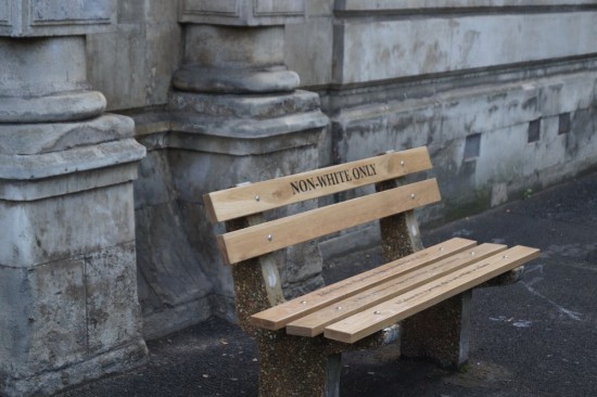 Part of the Apartheid Memorial outside the government building where racial ID cards were once distributed. There's a "Whites Only" bench as well.