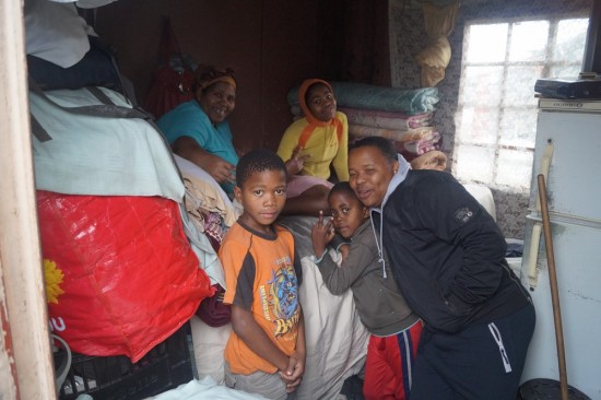 This family of four (not including Chippa who couldnt resist photo bombing) all live in this tiny half of a shipping container.