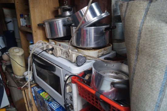 This was their kitchen. When I asked about house fires we were told that they were very common.