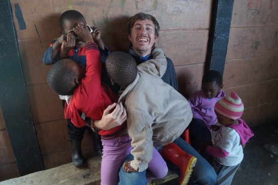 After a while a number of the kids began to use Adam like a jungle gym.